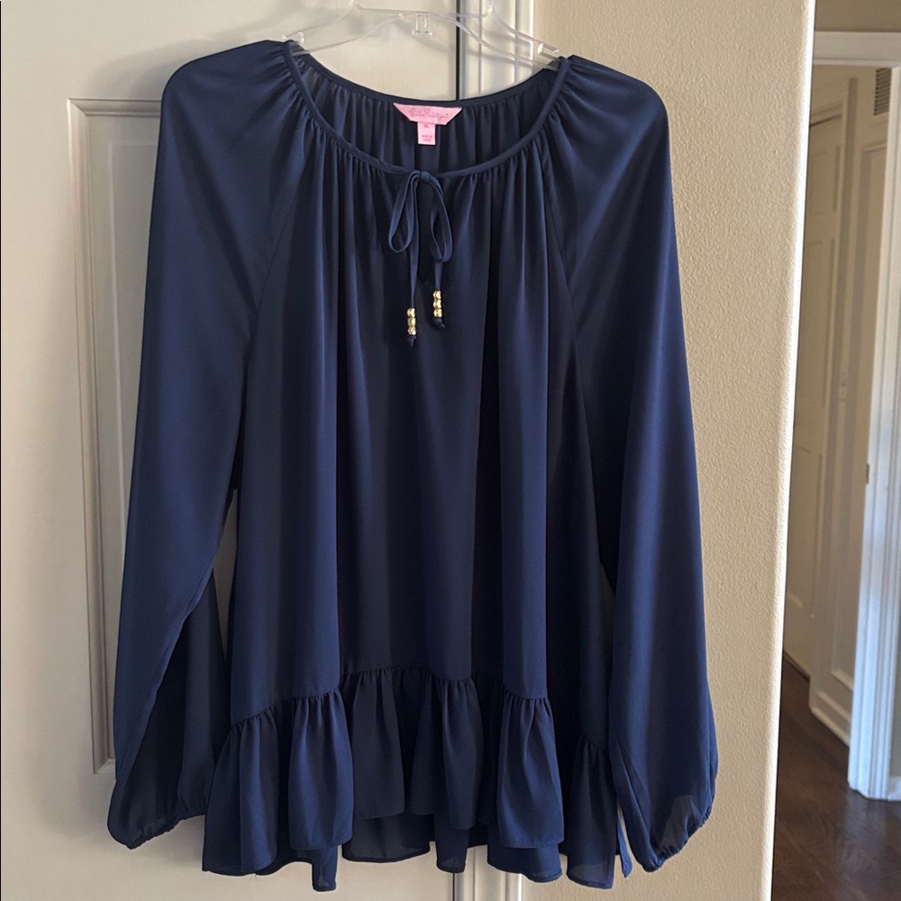 Lilly Pulitzer navy blouse with cute tie and ruffle bottom